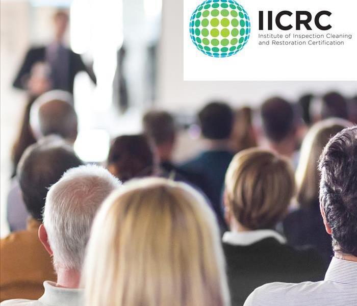People on training, logo of IICRC