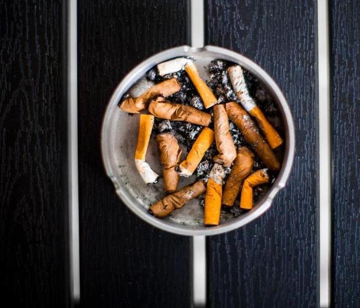 Ash tray containing cigarette butts